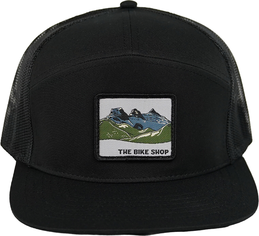 7 Panel Trucker - Woven Crest